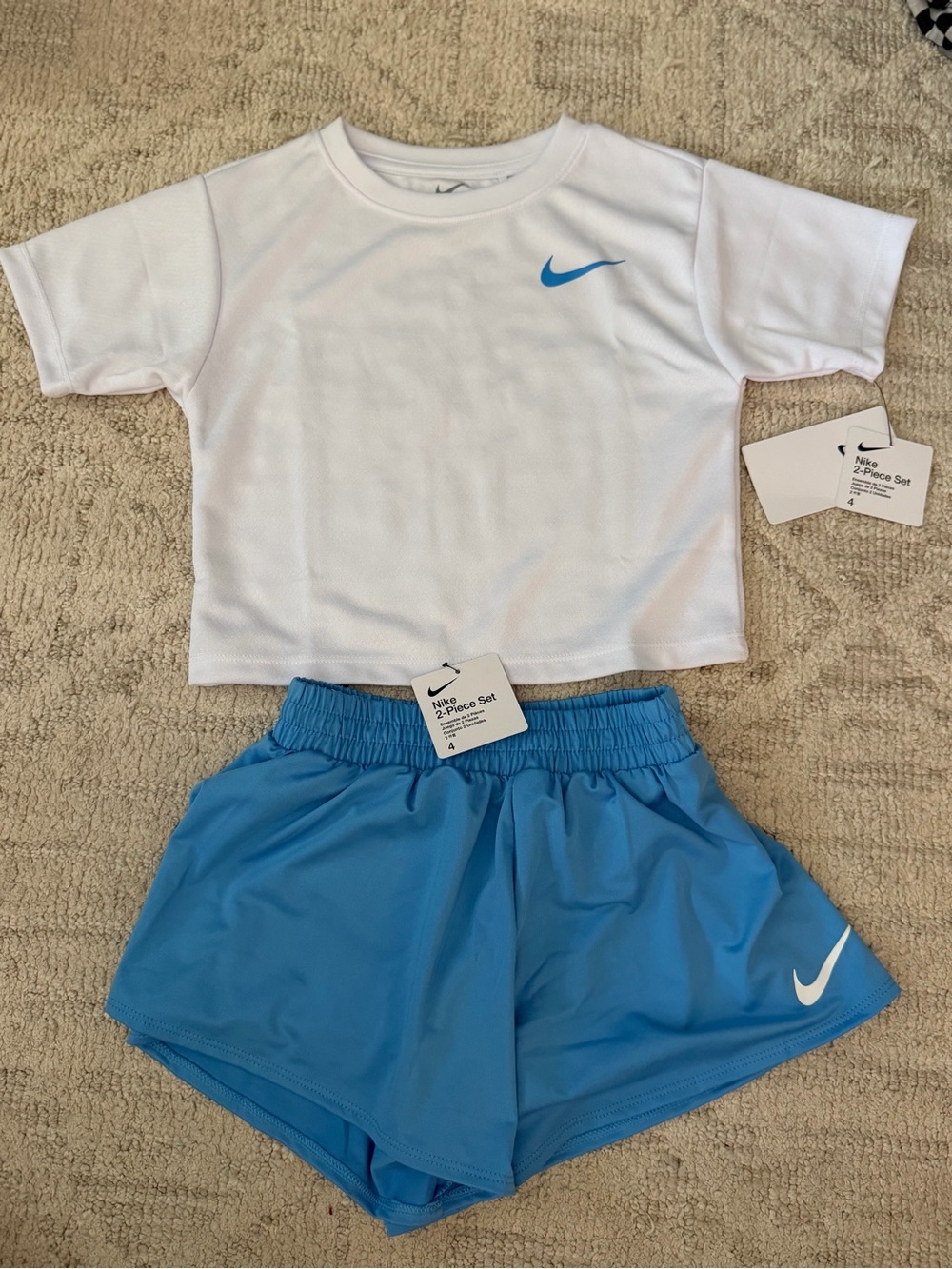 Nike White Crop Tee with Blue Swoosh and Blue Athletic Shorts